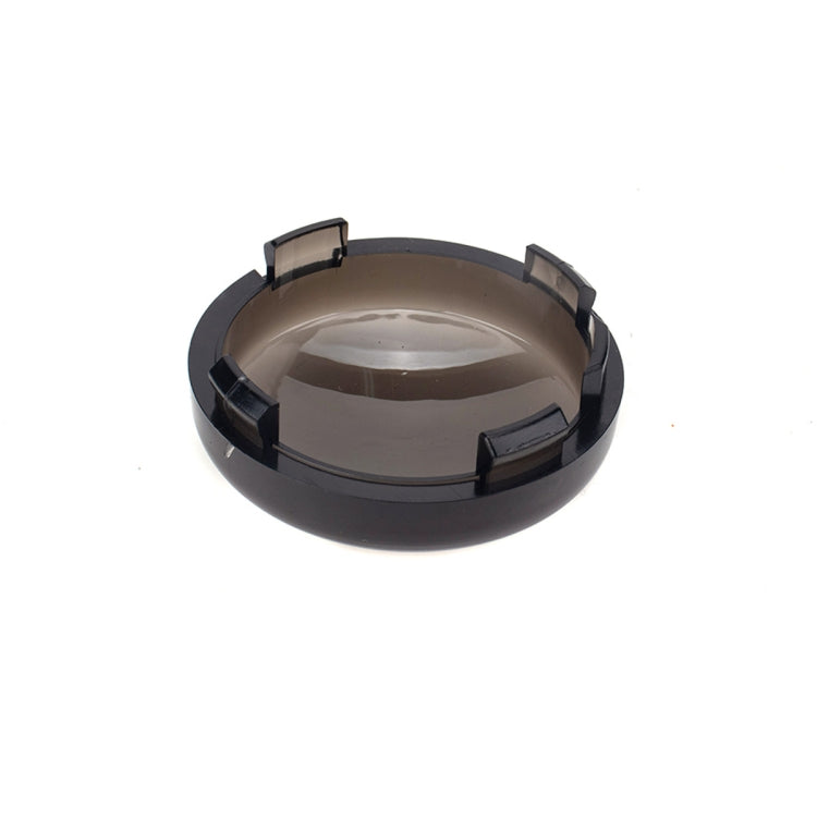 Black smoked motorcycle turn signal cover shell, open underside view with clips