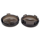 Two black smoked motorcycle turn signal cover shells with top openings and clips