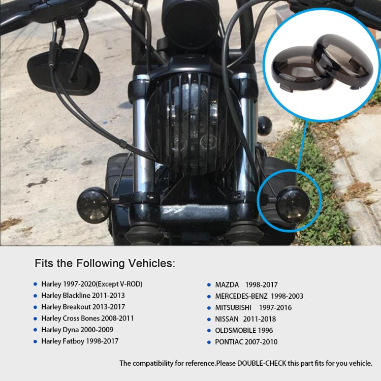 Motorcycle front with black turn signal cover shells highlighted for placement