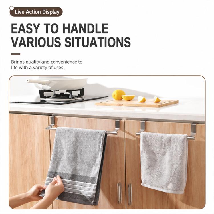 Stainless steel over-cabinet towel rack holding two folded towels on bars