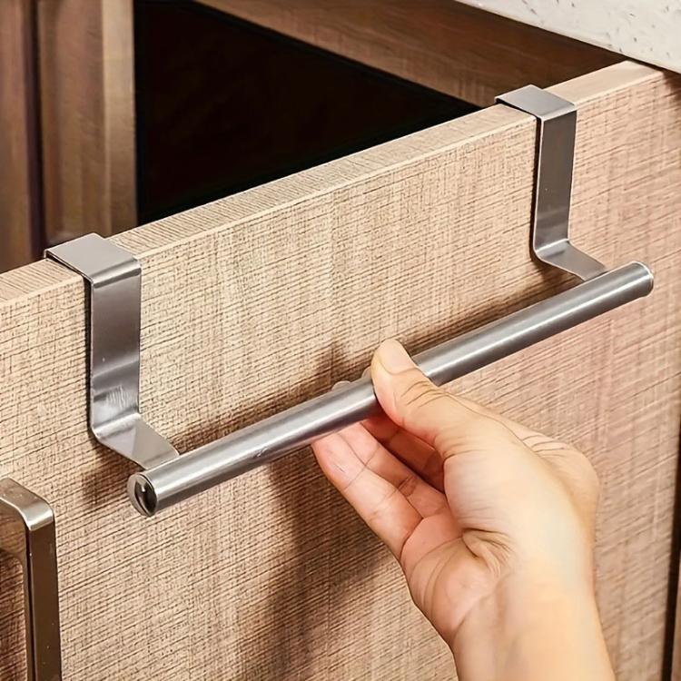 Hand adjusting stainless steel towel rack on cabinet door with end holders