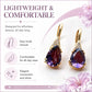 Lightweight gold-tone teardrop earrings with purple crystal drops and sparkling clear details.