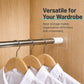Drill-free telescopic rod adhesive hook holder holding hangers on a wardrobe bar