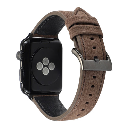 Brown litchi-textured genuine leather watch band with metal buckle and punched holes