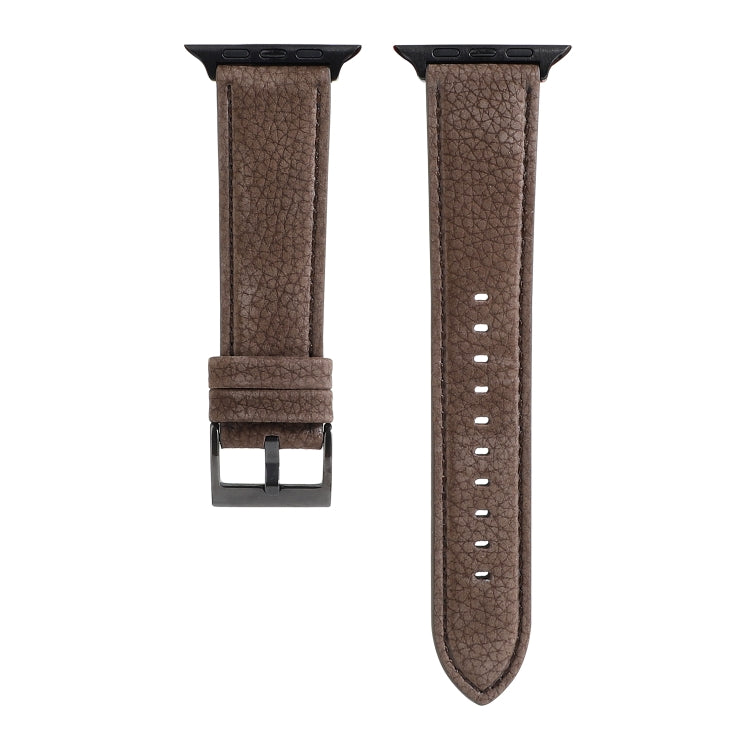 Brown litchi-textured genuine leather watch band with metal buckle and multiple holes