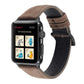 Brown litchi-textured genuine leather watch band with metal buckle, worn with Apple Watch