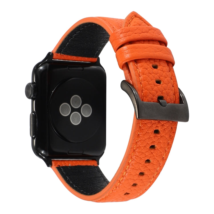 Orange litchi-textured genuine leather watch band with metal buckle and punched holes