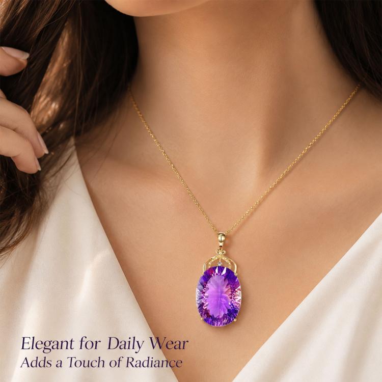 Gold-tone amethyst oval pendant necklace with purple gemstone on thin chain