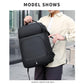 Black laptop backpack with front organizer panel and grab handle