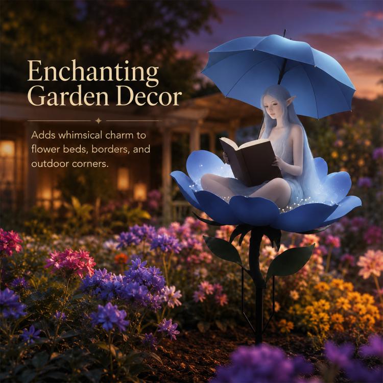 Decorative garden stake with blue umbrella fairy holding a book above flower