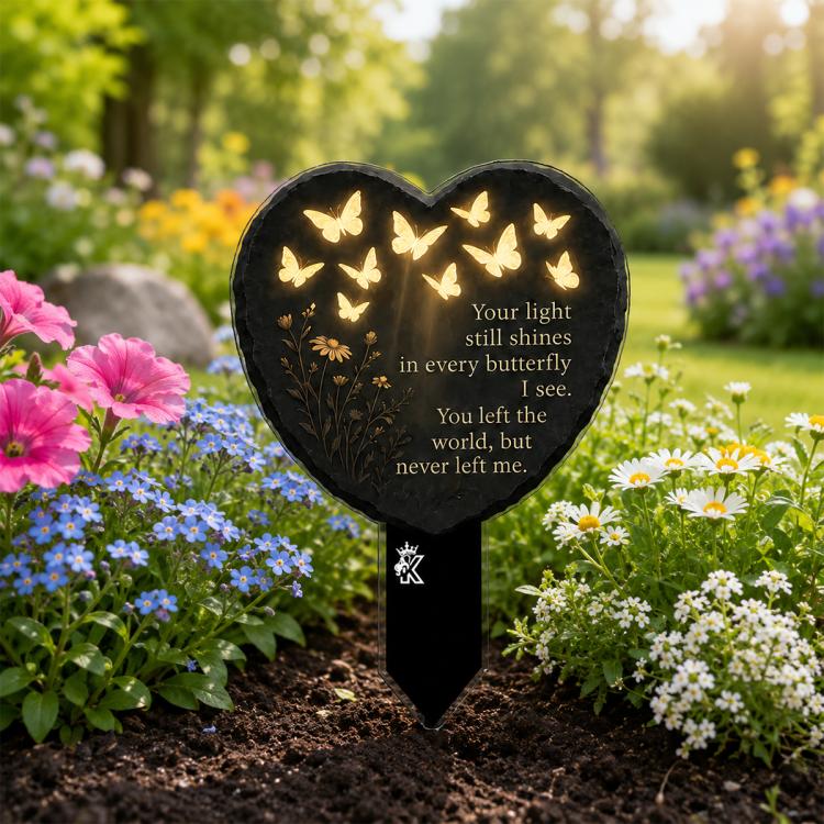 Heart-shaped garden stake with glowing butterflies and decorative quote panel