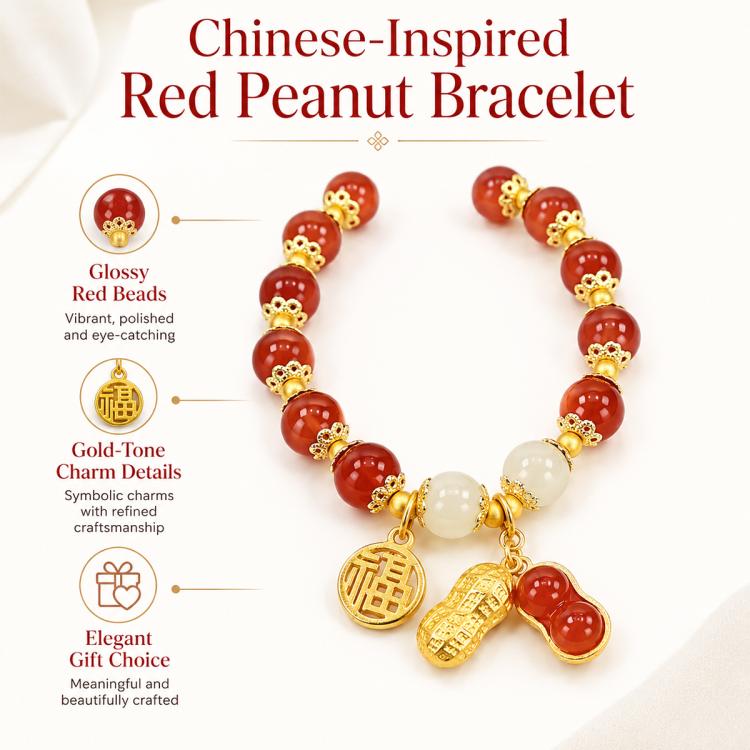 Red beaded peanut charm bracelet with gold-tone charms and white bead accents