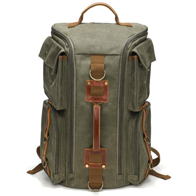 Military green canvas travel backpack with top handle, side zippers, and front utility straps
