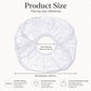 Disposable shower cap, flat round view with elastic inner opening and cap size markings