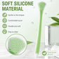 Green soft silicone tongue scraper with textured brush head and rounded handle
