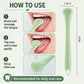 Green ergonomic silicone tongue scraper with hanging loop and curved scraper side
