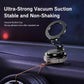 Black foldable car phone holder with vacuum suction cup on dashboard