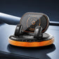 Black-and-orange car phone mount with rotating vacuum base and glowing ring