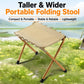 Khaki portable folding camping stool, wide square fabric seat on steel legs