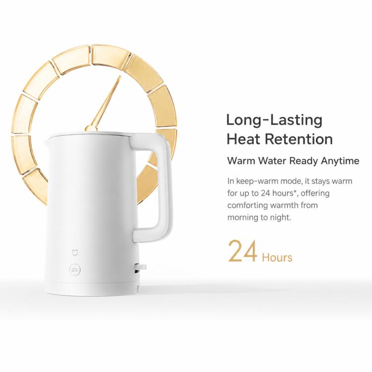 White electric kettle with gold accent ring around the top lid.