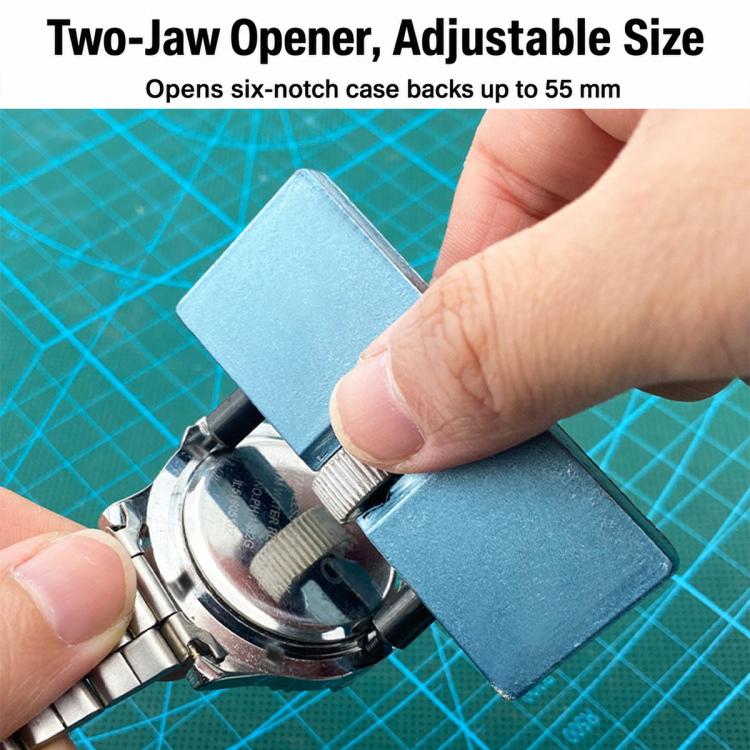 Two-jaw watch case opener pressing against watch case back with blue tool pads