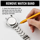 Yellow spring bar tool with fork tip removing a metal watch band