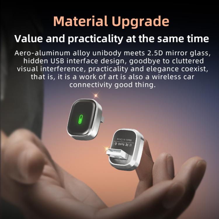 Wireless car adapter, small silver module with black face and green light