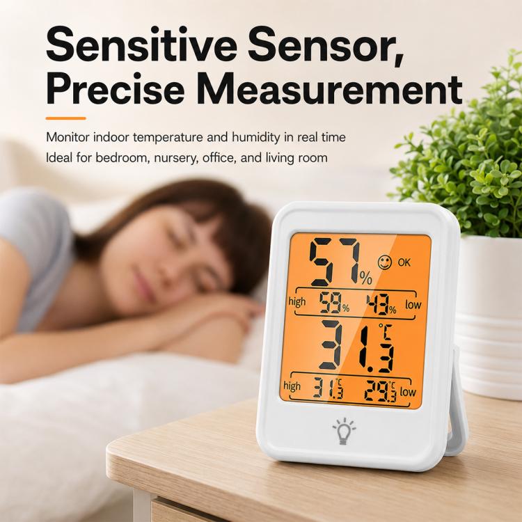 White indoor thermometer and hygrometer with backlit digital temperature and humidity display