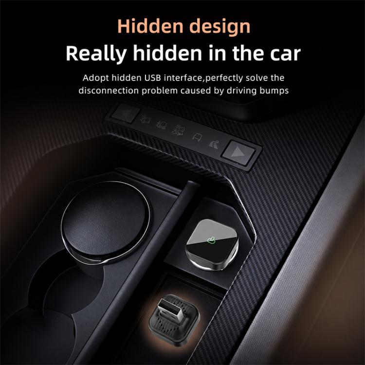 Small black USB wireless adapter for car dashboard with visible connector