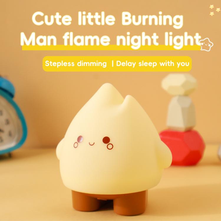 Warm beige flame night light with smiling face and round glasses, softly glowing