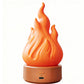 Orange LED simulated flame lamp on a tan round base, glowing flame effect