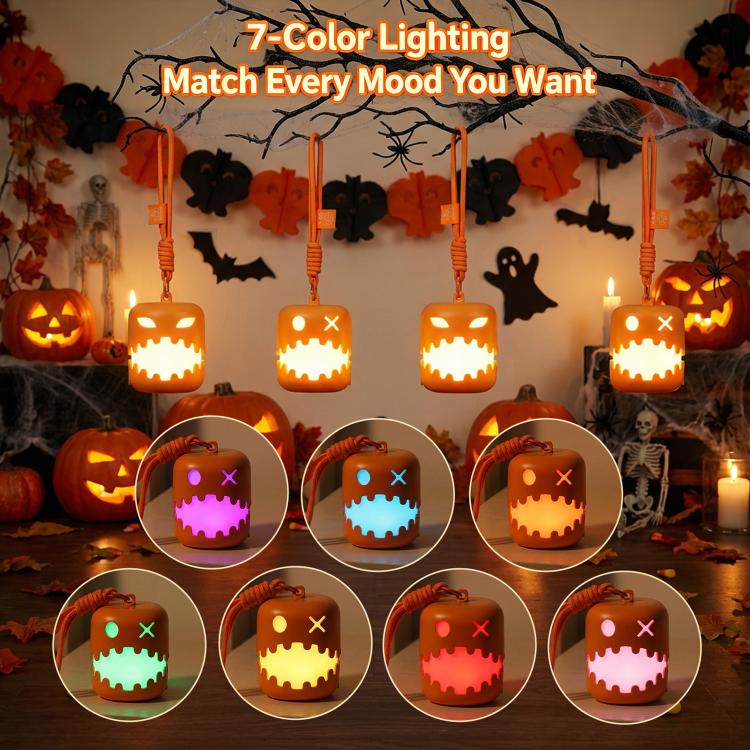 Set of glowing orange pumpkin lantern night lights with jack-o'-lantern faces.