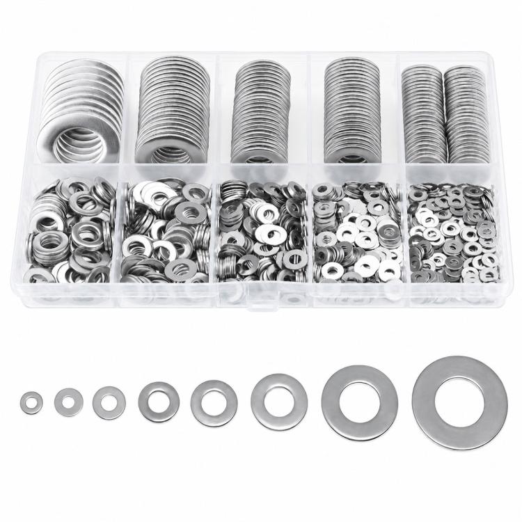 Divided clear case holding stacked flat metal washers with loose washers below