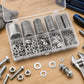 Silver round flat washers and spacers arranged in a clear plastic organizer tray