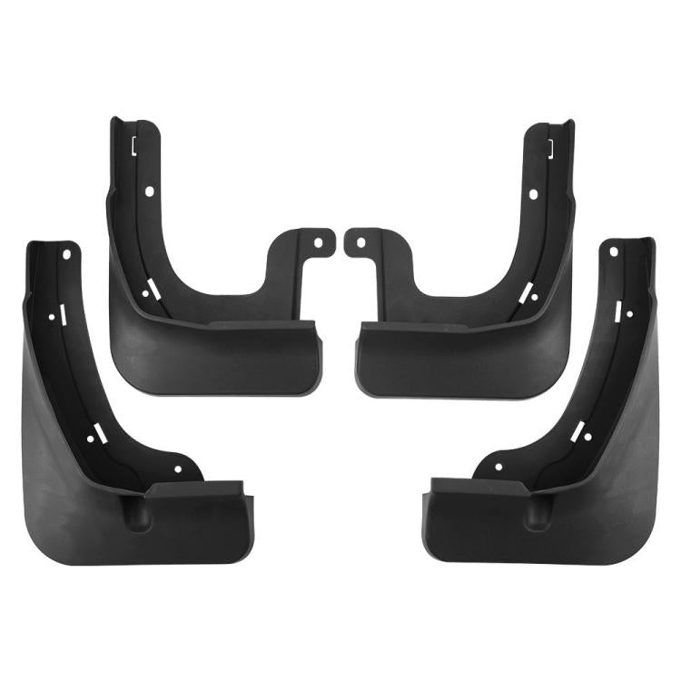 Set of four black wheel splash guards/mud flaps with mounting holes