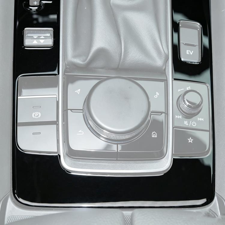 Center console gear panel sticker with EV button and circular control overlay