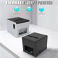 Thermal receipt printer with black casing, showing front display and paper compartment