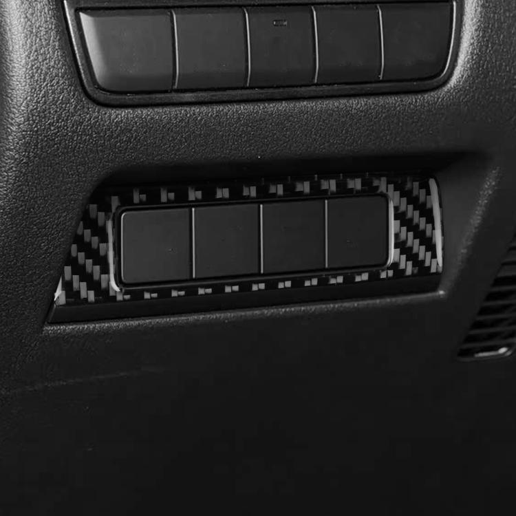 Black carbon-fiber headlight switch panel trim sticker, close-up around switch area