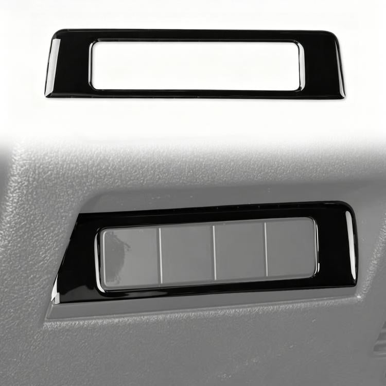 Mazda CX-50 headlight switch panel sticker, black glossy bezel with clear rectangular insert