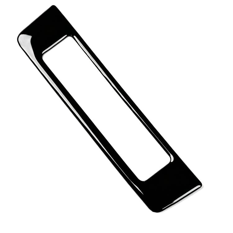 Mazda CX-50 headlight switch panel sticker, diagonal view of black bezel and clear rectangle