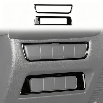 Car headlight switch panel trim stickers, silver and black frames on dashboard