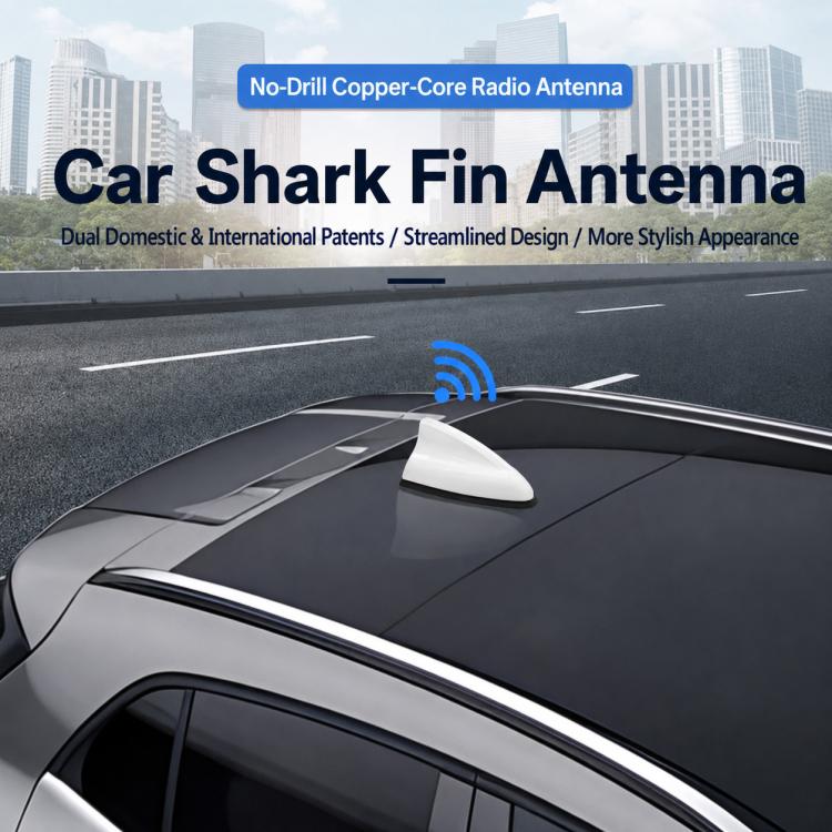 Gray shark fin car antenna mounted on a vehicle roof