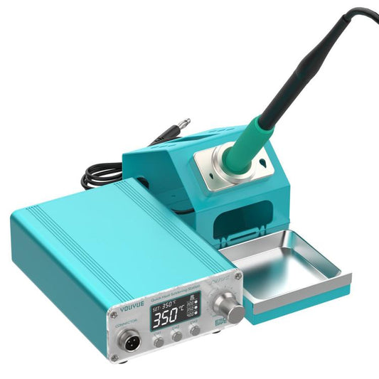 Compact soldering station with stand, digital temperature display, teal and green grip