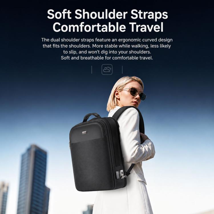 Black smart backpack worn on shoulder with front pocket and lock strap