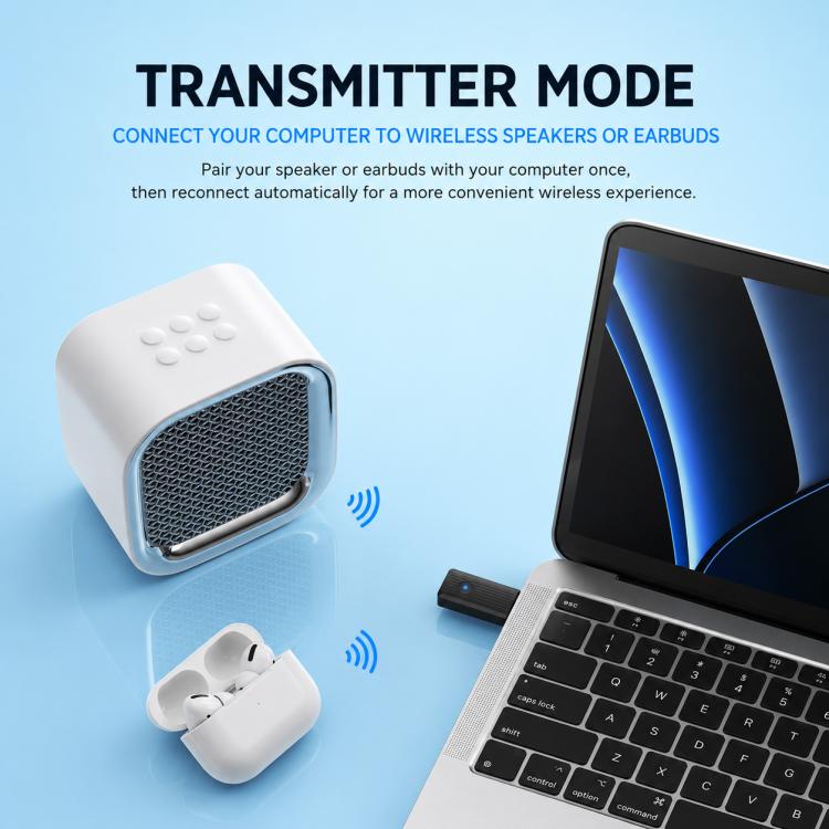 Wireless Bluetooth audio transmitter in use beside phone and laptop with connected earbuds