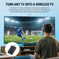 Black wireless Bluetooth audio transmitter adapter near TV and headphones for listening