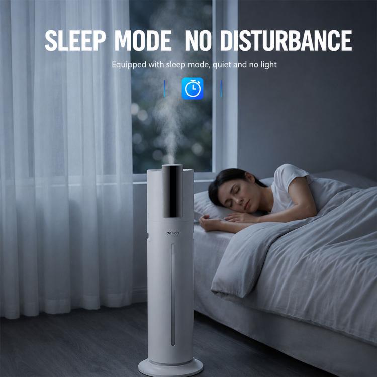White ultrasonic humidifier in sleep mode with low-light indicator on display.