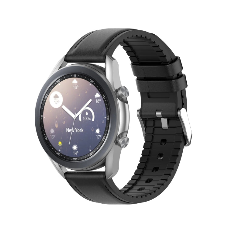 Black 20mm watch strap with perforated design and metal buckle on a round watch