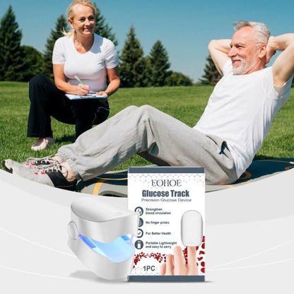 White portable glucose tracker device with blue indicator light and handle, with box.
