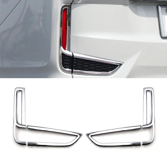 Rear bumper fog light decorative chrome trim with vertical accent on tail light area